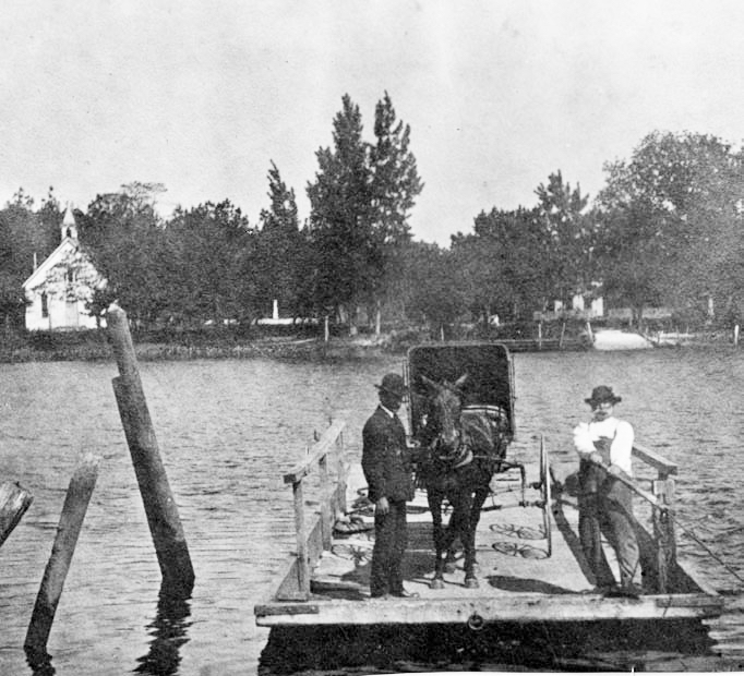 This is the earliest known photograph of the Woodland Ferry, taken around 1900. The ferry operator is probably William B. Ellis, who was hired in the 1880s. In the background is Woodland United Methodist Church. DELDOT ARCHIVES